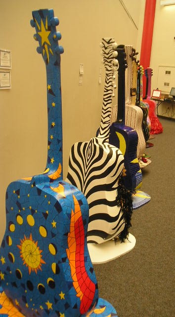 0706/Timika_s_Guitars_for_ships_hope_0202450.jpg